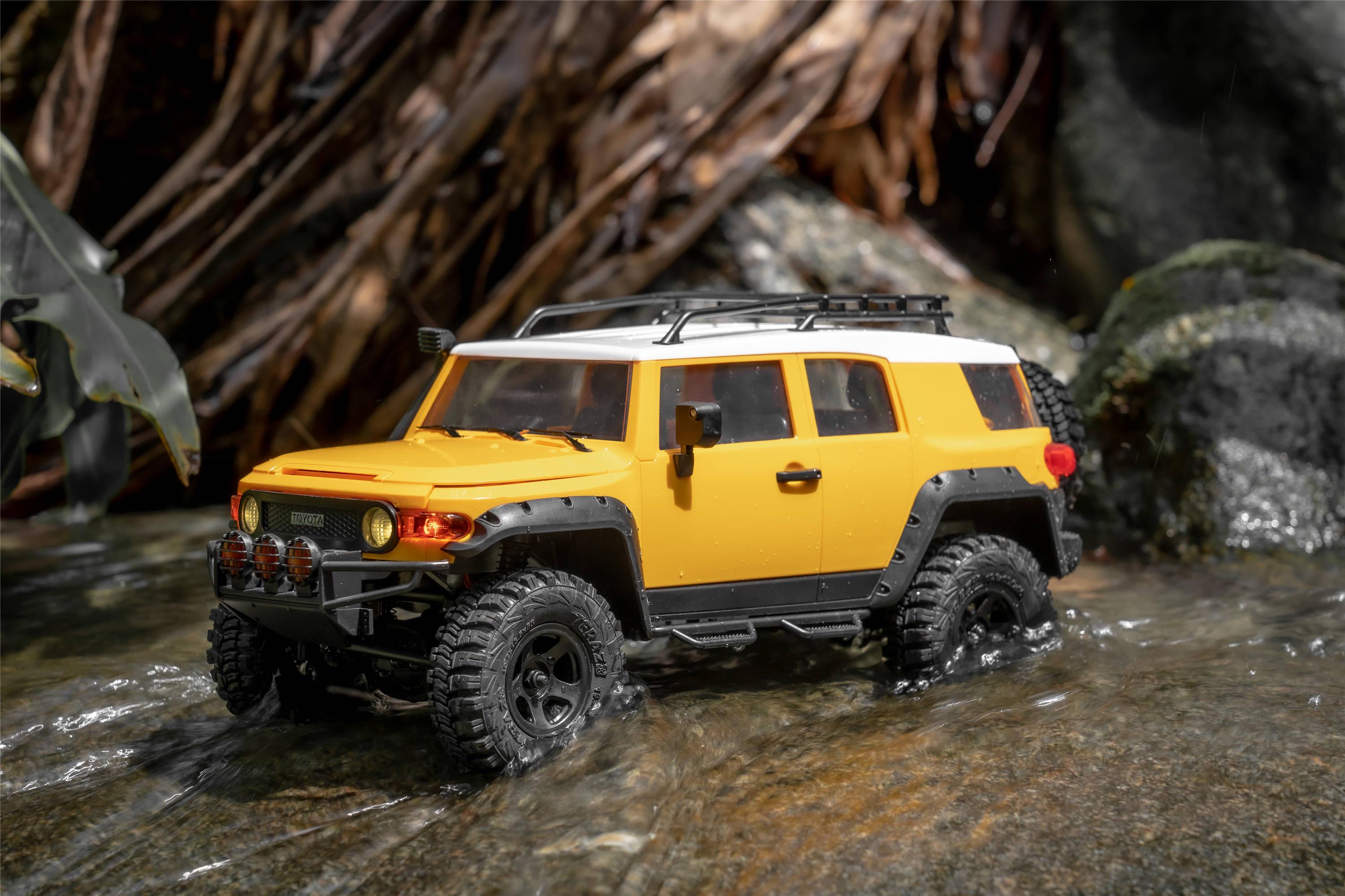 Машинка на радиоуправлении FMS 1:18 FJ Cruiser RTR Yellow - фото 12 Машинка на радиоуправлении FMS 1:18 FJ Cruiser RTR Yellow - фото 12