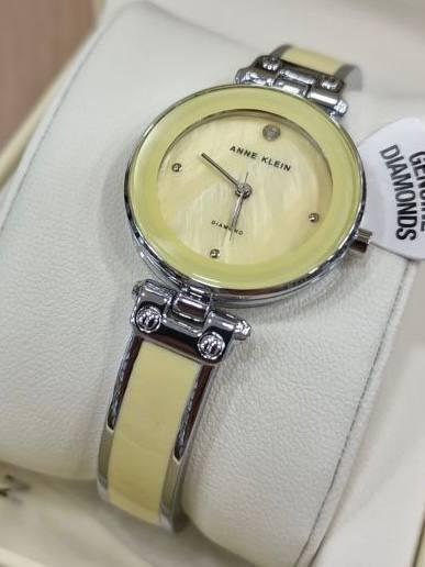 Наручные часы женские Anne Klein AK/1981YLSV с серебристым циферблатом и стальным браслетом