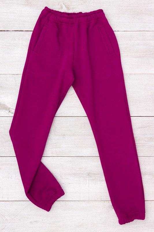 Спортивні однотонні штани-джогери для дівчинки Носи Своє 122 см Малиновий (6060-057-5) Спортивні однотонні штани-джогери для дівчинки Носи Своє 122 см Малиновий (6060-057-5)