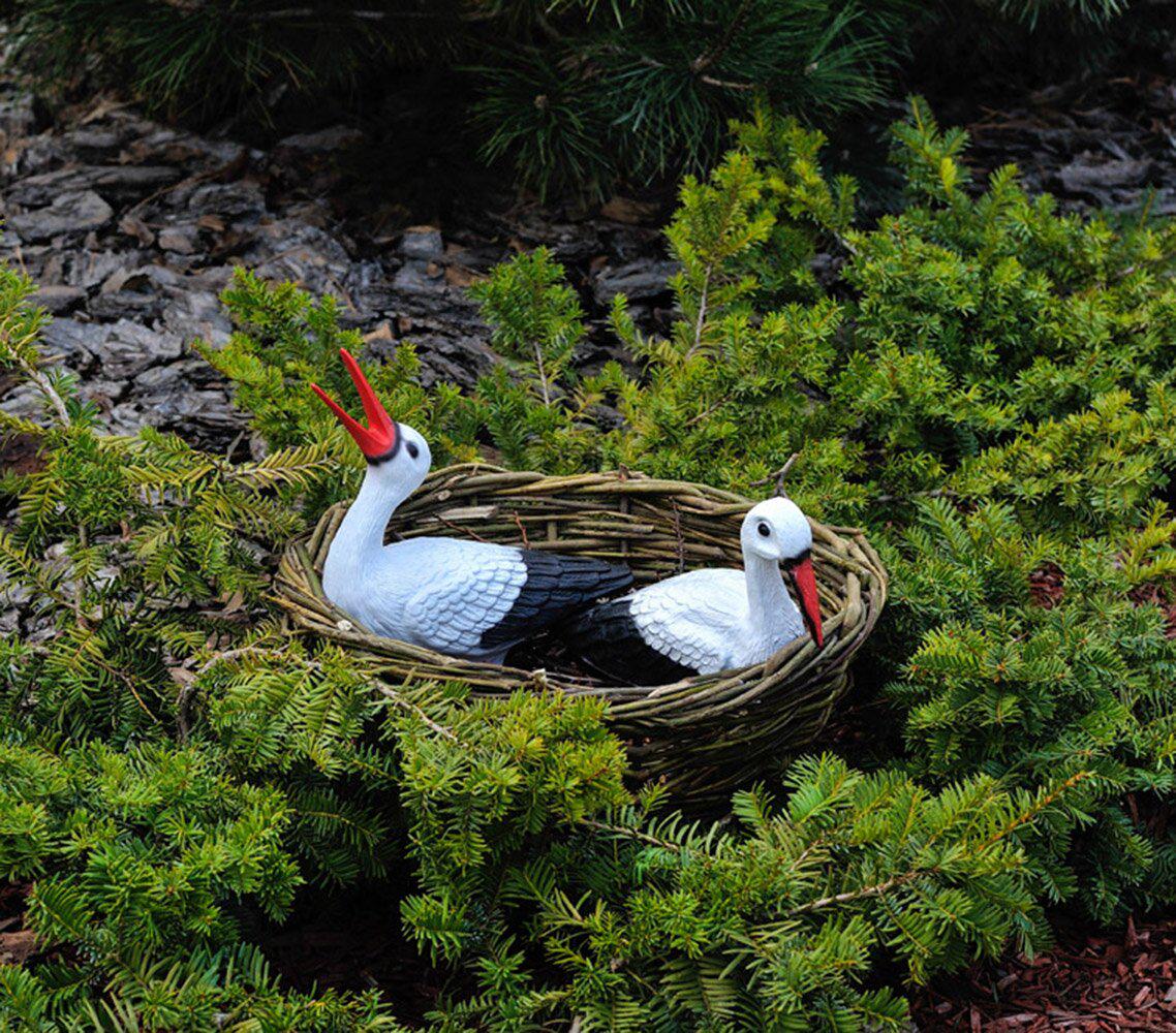 Садовая фигура Семья аистов №48 в гнезде