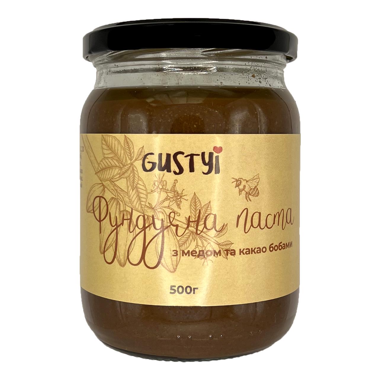 Шоколадно-фундучная паста с медом и какао бобами ТМ Gustyi 500 г (10817835) - фото 1 Шоколадно-фундучная паста с медом и какао бобами ТМ Gustyi 500 г (10817835) - фото 1
