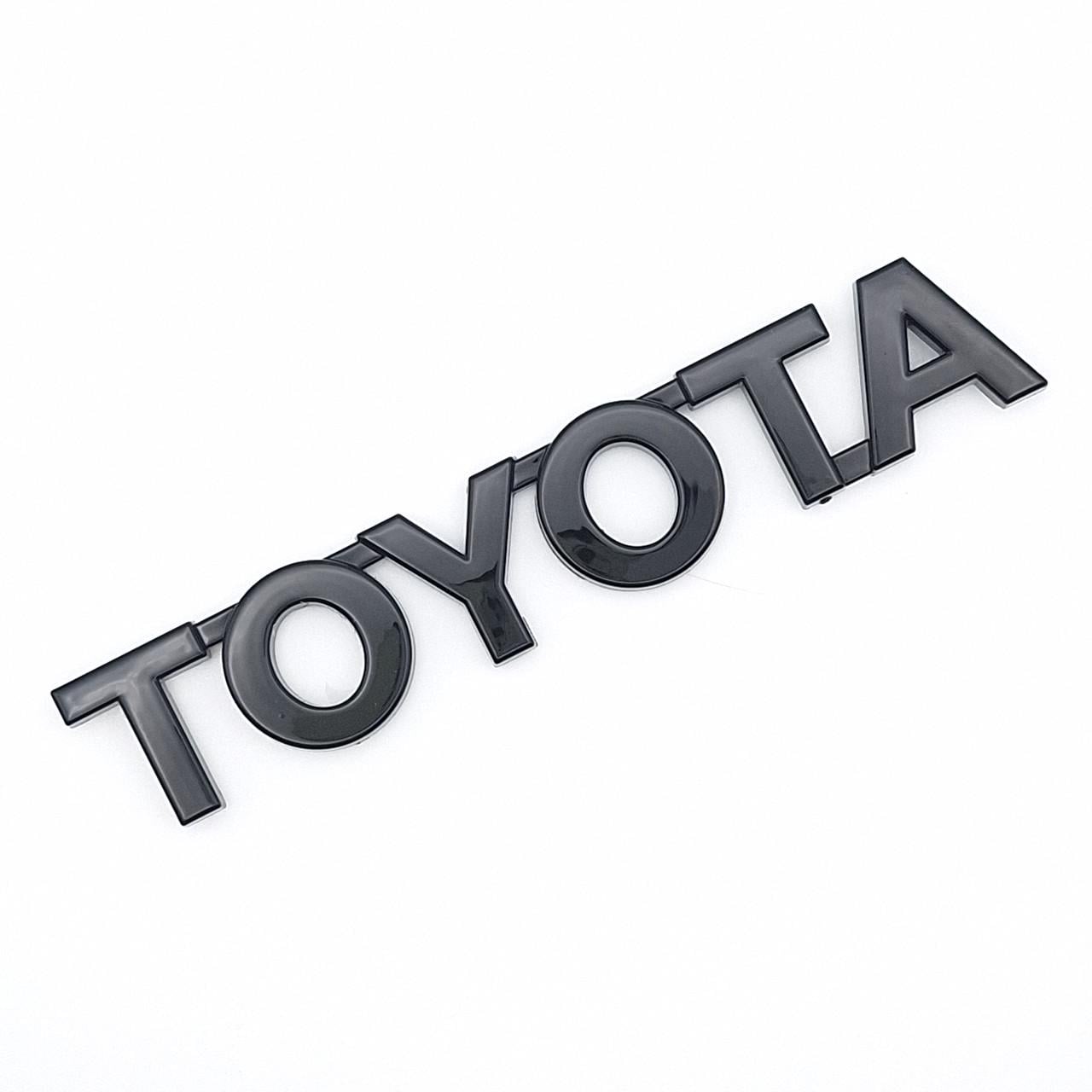 Емблема напис Toyota ABS 11,3х2 см Чорний глянцевий (2452647093)