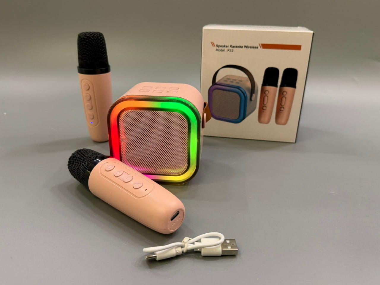 Колонка портативная 2 беспроводных микрофона/подсветка TFслот Bluetooth USB зарядка 15,5-15-8 см Розовый (K12) Колонка портативная 2 беспроводных микрофона/подсветка TFслот Bluetooth USB зарядка 15,5-15-8 см Розовый (K12)