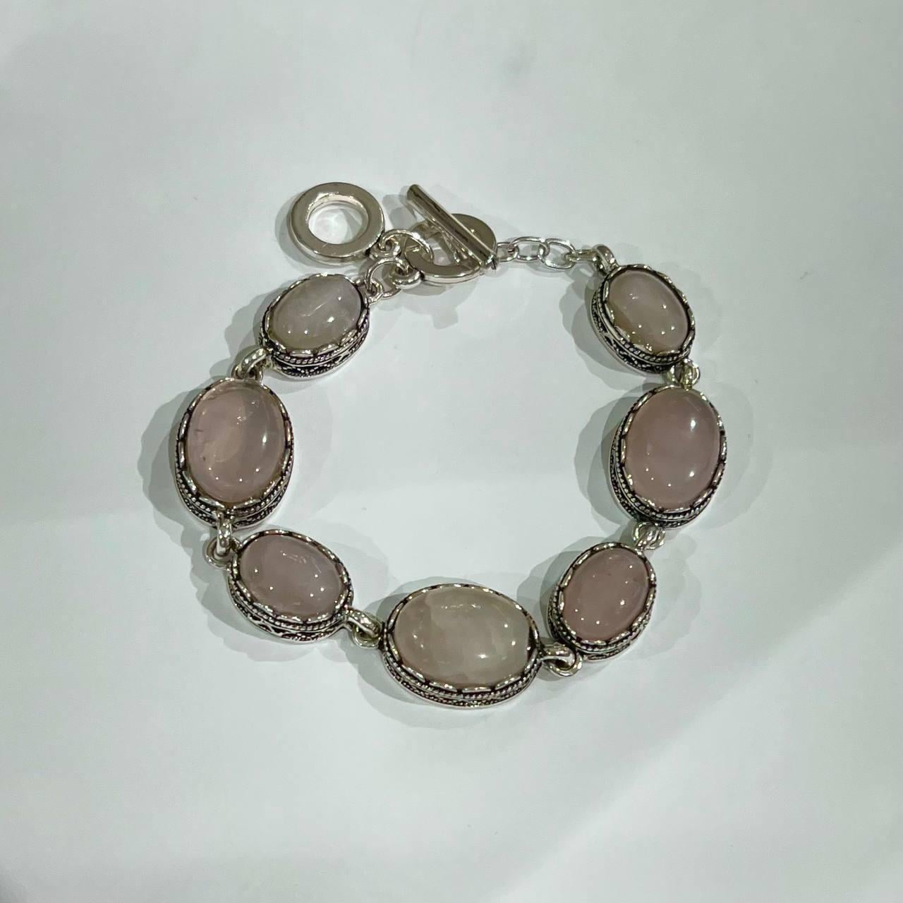 Браслет из натурального камня кварц розовый овальной формы 13-20 мм в серебристой оправе зубчик (85308160) Браслет из натурального камня кварц розовый овальной формы 13-20 мм в серебристой оправе зубчик (85308160)