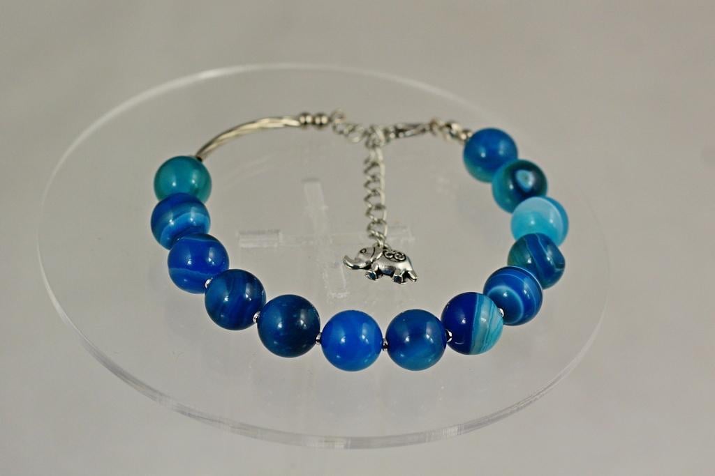 Браслет жорсткий з синього агату 20 см 10 мм Сріблястий (32520620)