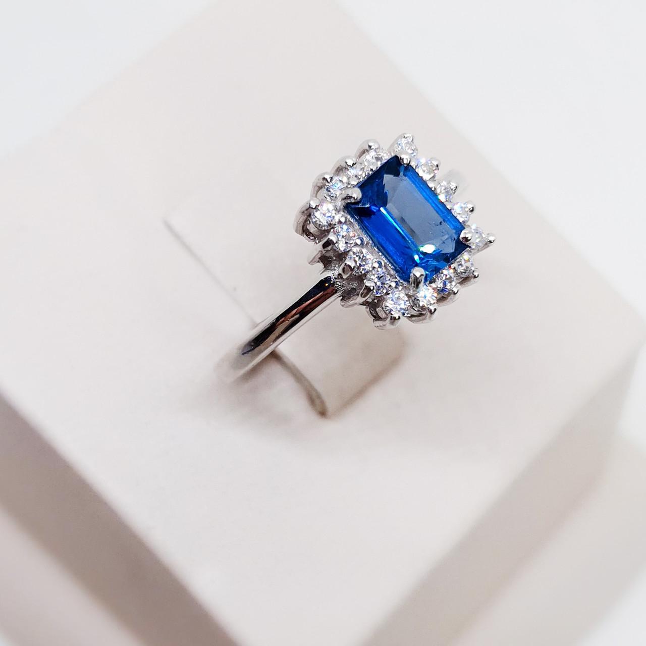 Кольцо серебряное с лондон топазом и кубическим цирконием р. 18 3,1 г (1531856456)