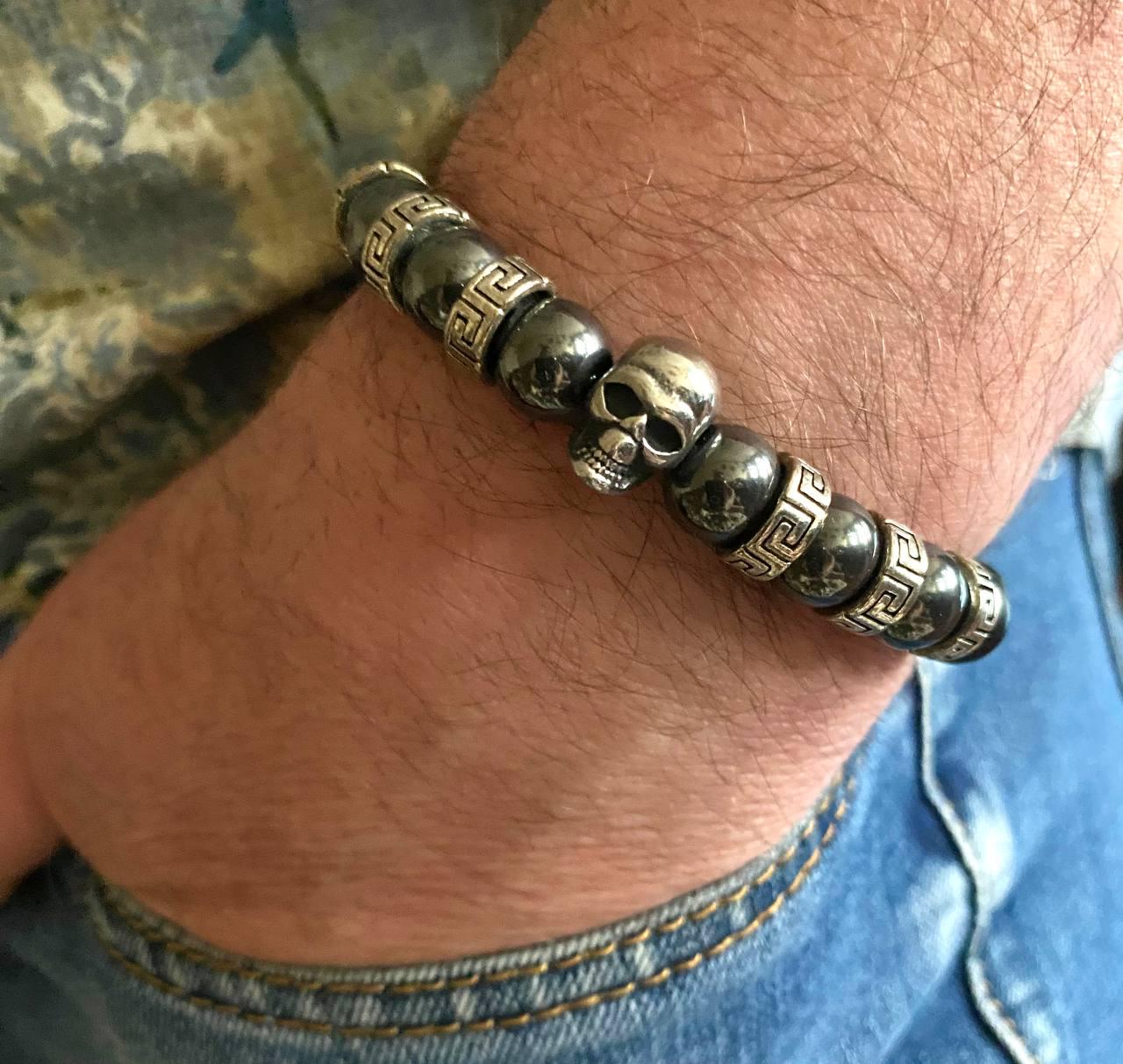 Браслет LITAURS из натурального камня черный оникс гематит d 10 мм с черепом и металлическими вставками М 15-17 см (24111) - фото 2 Браслет LITAURS из натурального камня черный оникс гематит d 10 мм с черепом и металлическими вставками М 15-17 см (24111) - фото 2