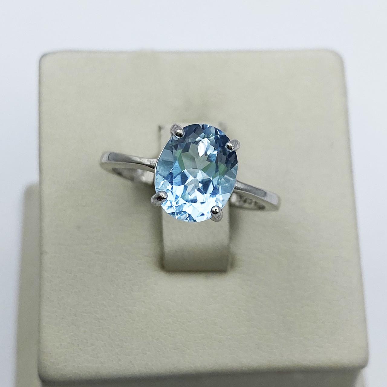 Кольцо серебряное с голубым топазом р. 18 2,6 г (1937561260)