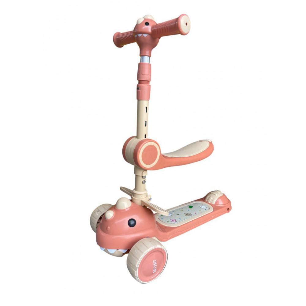 Самокат-биговел детский трехколесный 2в1 Kidwell 616 Dino с LED-подсветкой колес Pink (PH00135) Самокат-биговел детский трехколесный 2в1 Kidwell 616 Dino с LED-подсветкой колес Pink (PH00135)