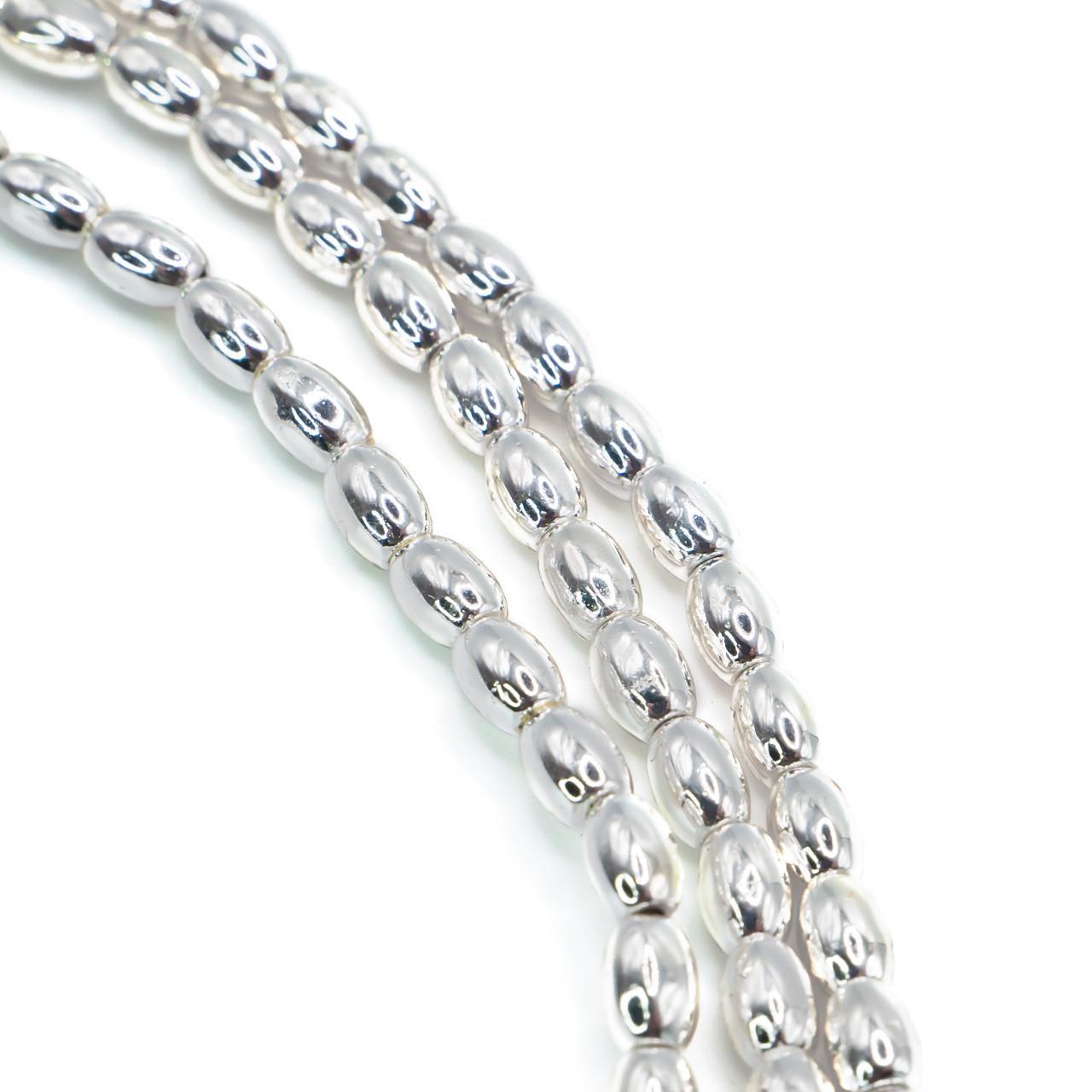 Бусины гематитовые Рис 4х6 мм 40 см 65 шт. Серебристый (БГ0406р00)