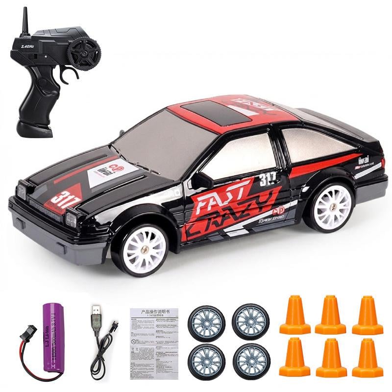 Машинка гоночная для дрифта 4WD на радиоуправлении полноприводная с комплектом сменных покрышек и световыми фарами аккумуляторная (N-006) Машинка гоночная для дрифта 4WD на радиоуправлении полноприводная с комплектом сменных покрышек и световыми фарами аккумуляторная (N-006)