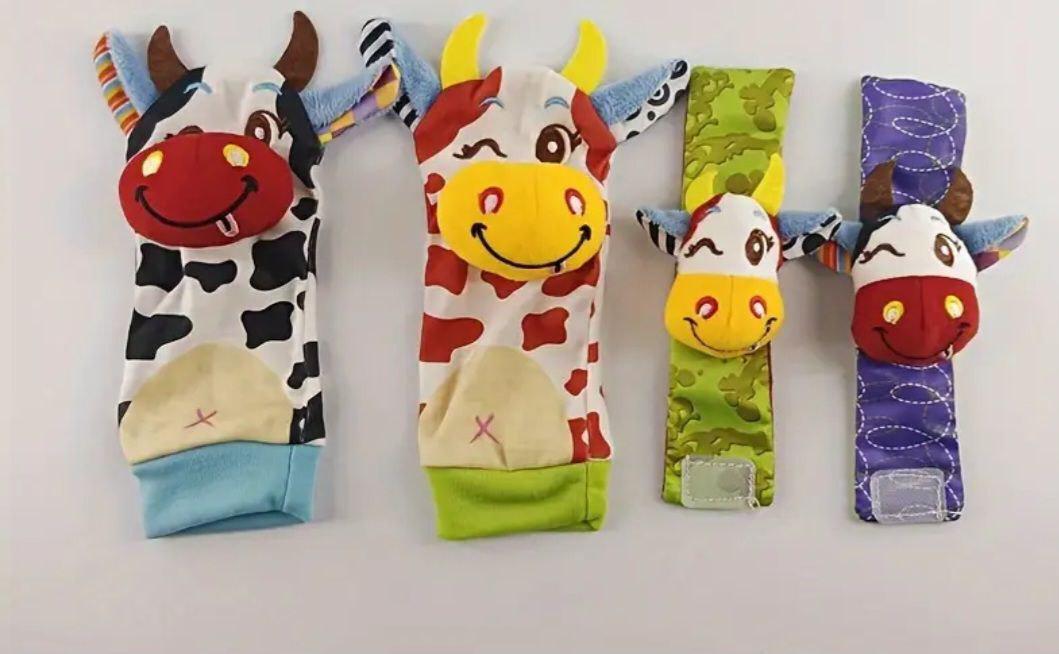 Игрушки мягкие Веселые коровки носки и браслеты с погремушками на ножки и ручки для малышей (Т-1023)