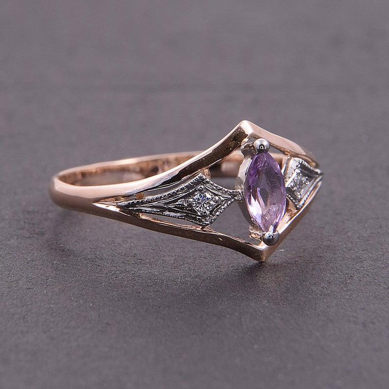 Кільце жіноче з червоного та білого золота з маркізом (2248340753)