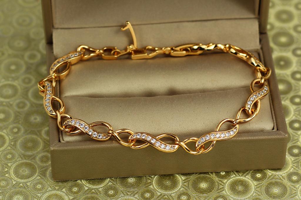 Браслет Xuping Jewelry Восьмерки с камешками 19 см 5 мм Золотистый (29822066)