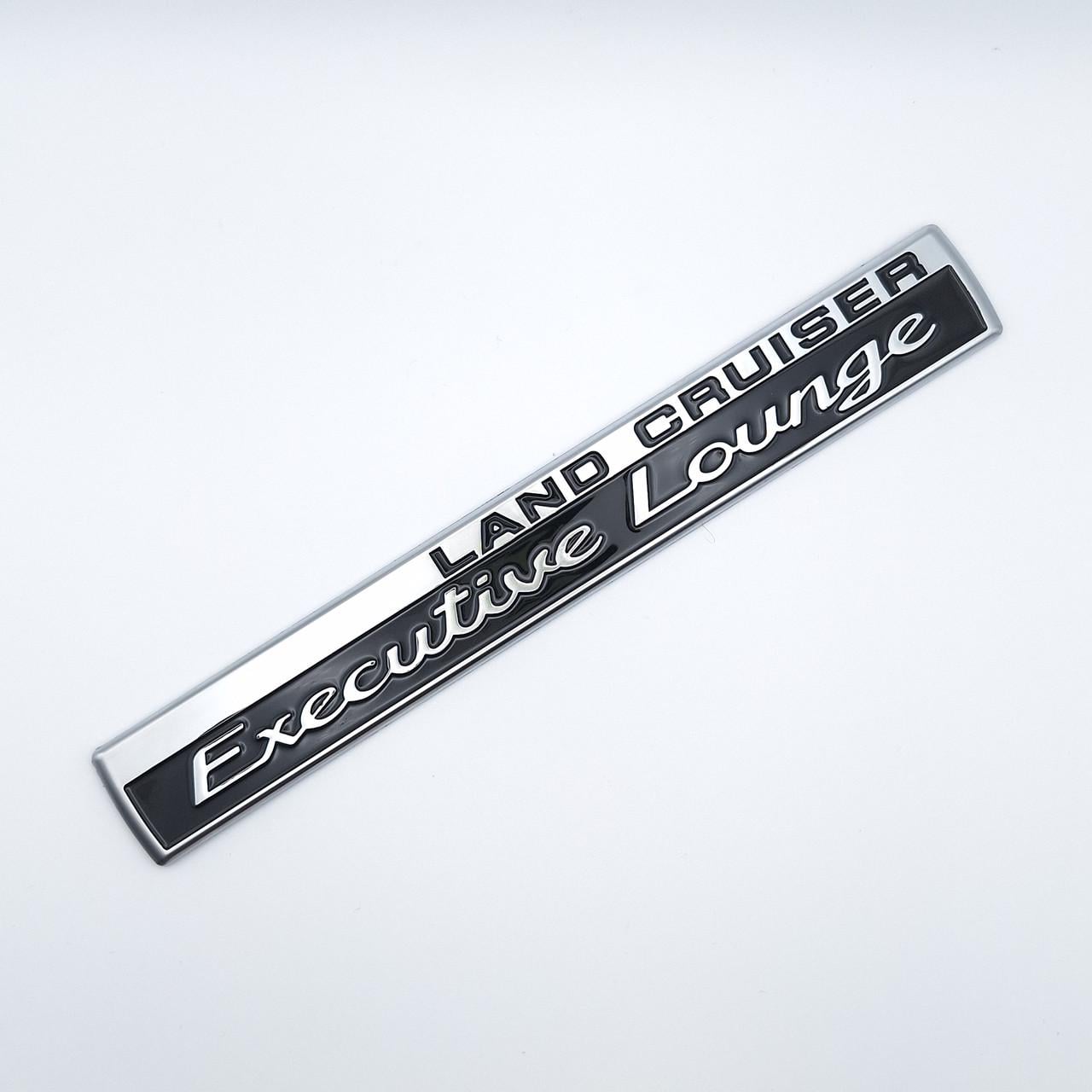 Эмблема надпись Land Cruiser Executive Lounge Toyota ABS 21х2,8 см Хром глянцевый/Черный матовый (1978530927)