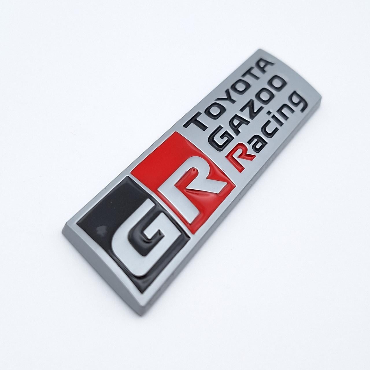 Эмблема плашка GR Toyota Gazoo Racing металл 9х2,3 см Хром матовый (2458445912)