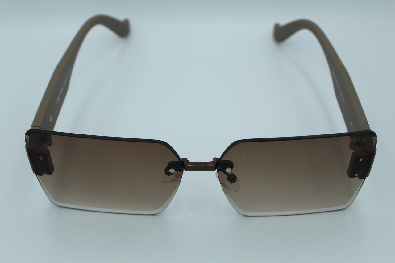 Сонцезахисні окуляри жіночі дизайнерські (58094 №1) - фото 3 Сонцезахисні окуляри жіночі дизайнерські (58094 №1) - фото 3