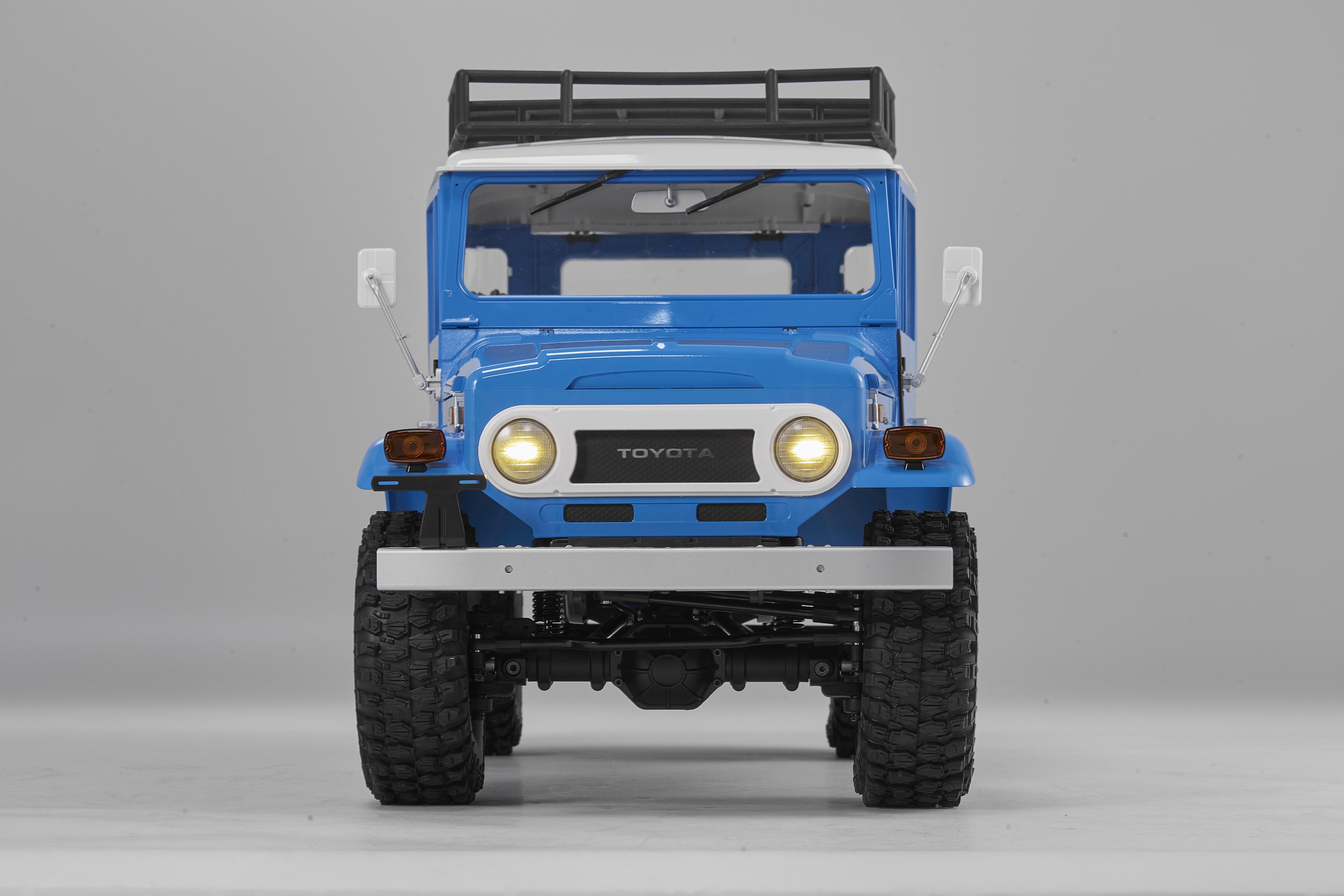 Машинка на радиоуправлении FMS 1:10 Toyota Land Cruiser FJ40 RS Blue - фото 10 Машинка на радиоуправлении FMS 1:10 Toyota Land Cruiser FJ40 RS Blue - фото 10