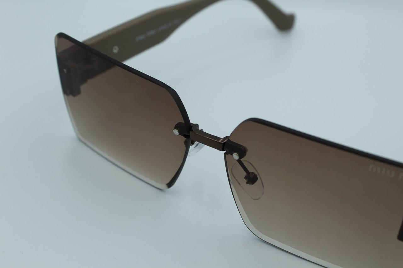 Сонцезахисні окуляри жіночі дизайнерські (58094 №1) - фото 6 Сонцезахисні окуляри жіночі дизайнерські (58094 №1) - фото 6