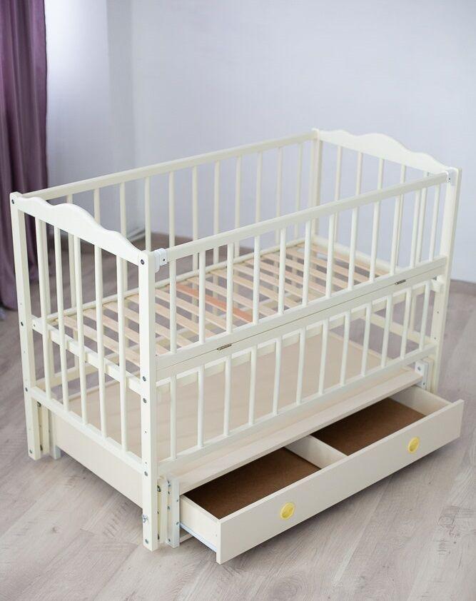 Детская кроватка Ангелина шарнир-подшипник с откидной боковиной/ящик Ivory (123576)