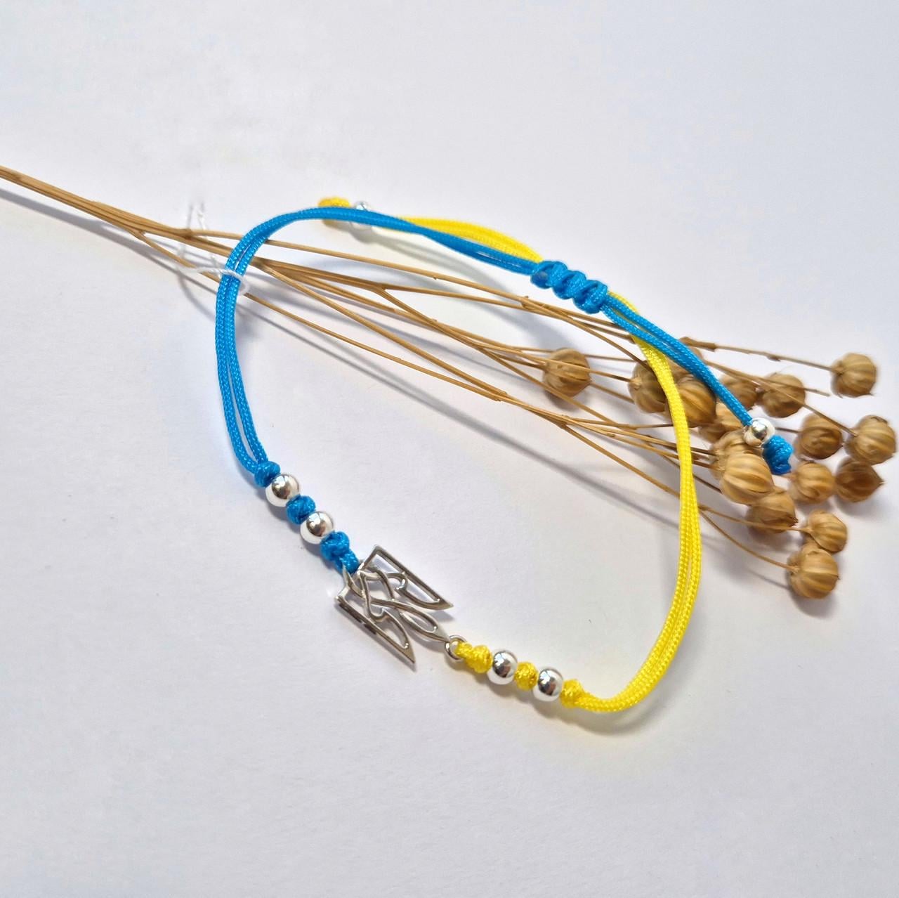 Браслет Оберег Тризуб без камней серебро 925 пробы родованное 1,58 г Желто-голубой (75264п)