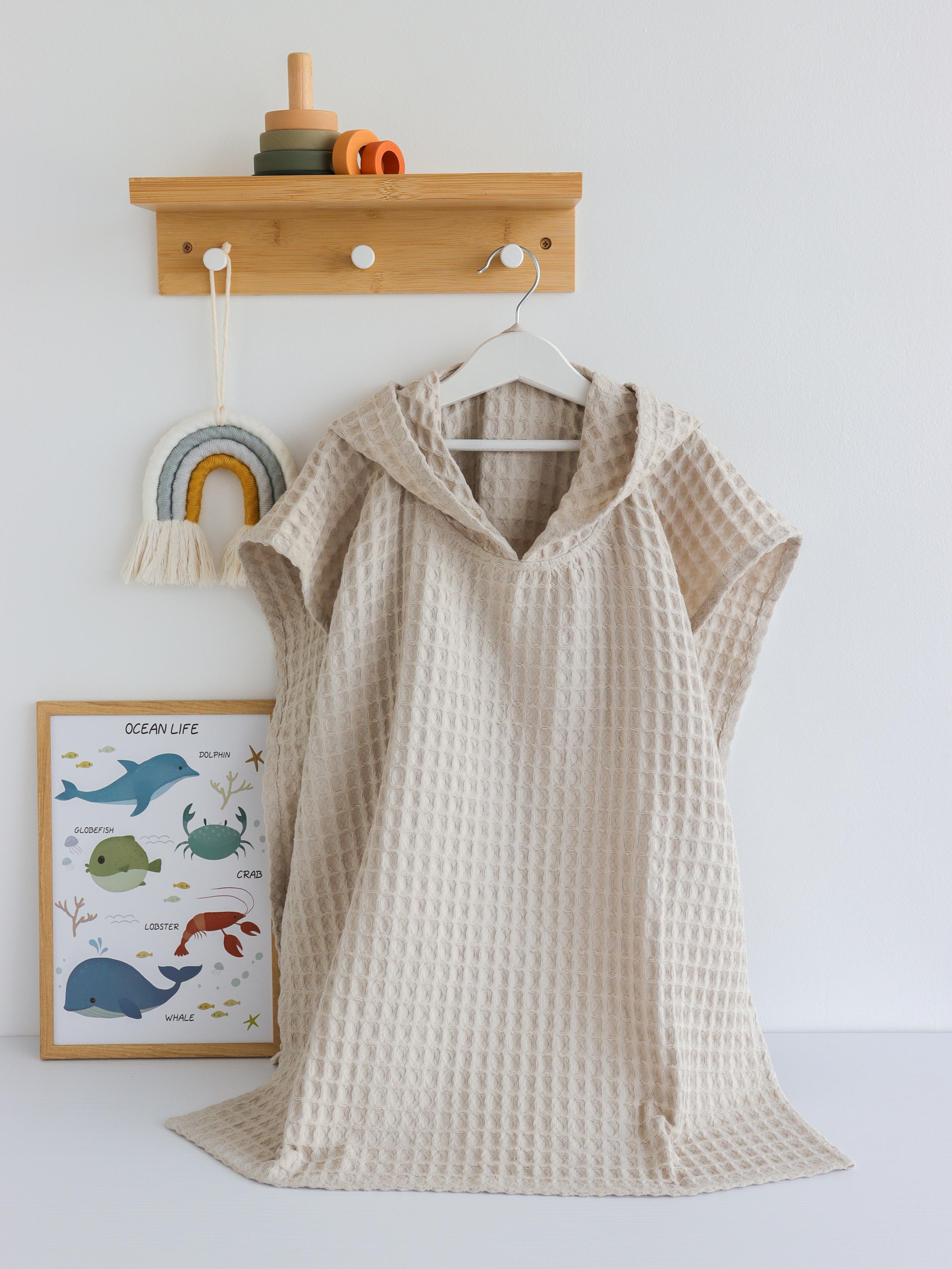 Полотенце-пончо детское Греческая вафелька хлопковое без вышивки 5-7 лет Бежевый (2121) Полотенце-пончо детское Греческая вафелька хлопковое без вышивки 5-7 лет Бежевый (2121)