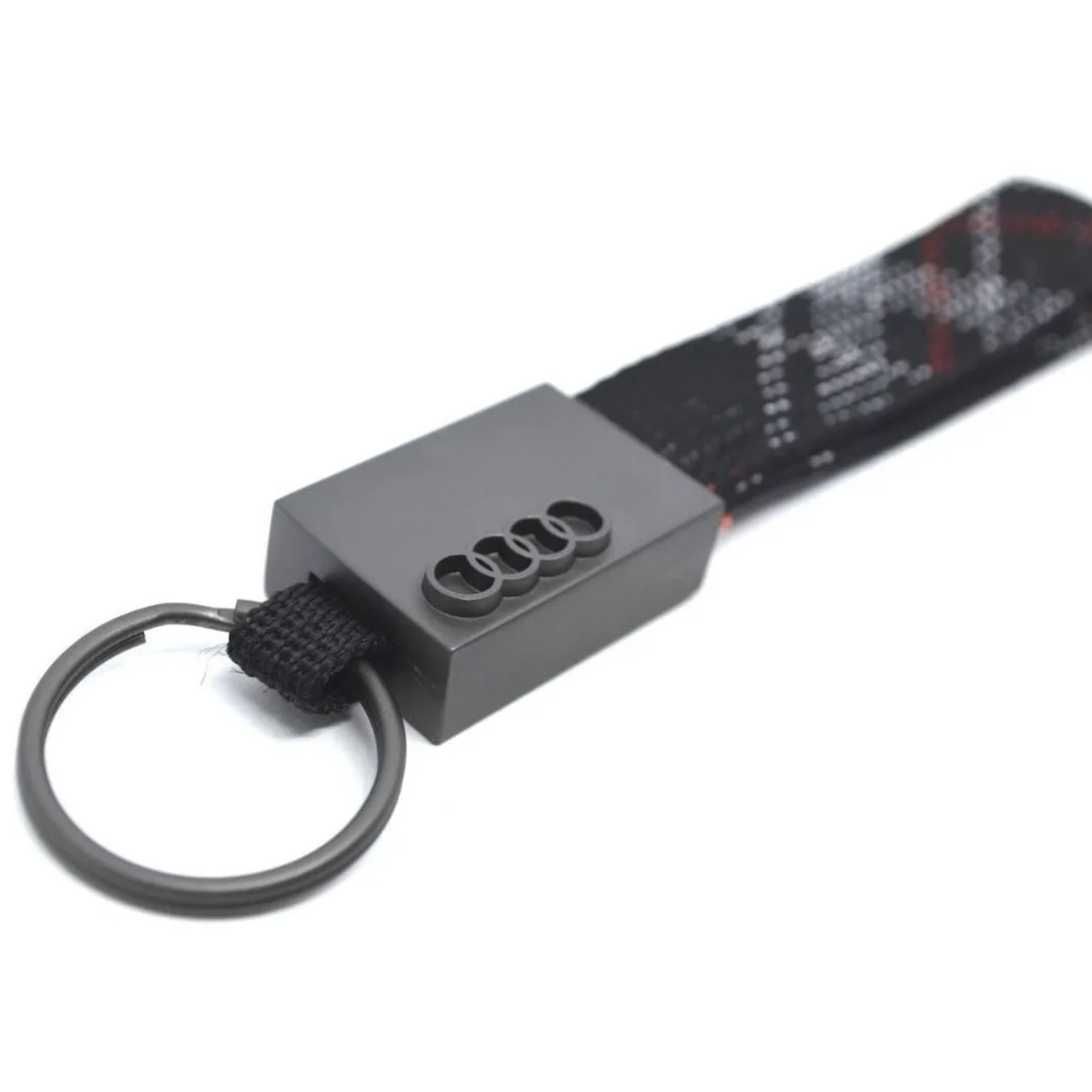 Брелок Audi металевий з тканиною 150x30 мм Чорний (7348568349) Брелок Audi металевий з тканиною 150x30 мм Чорний (7348568349)