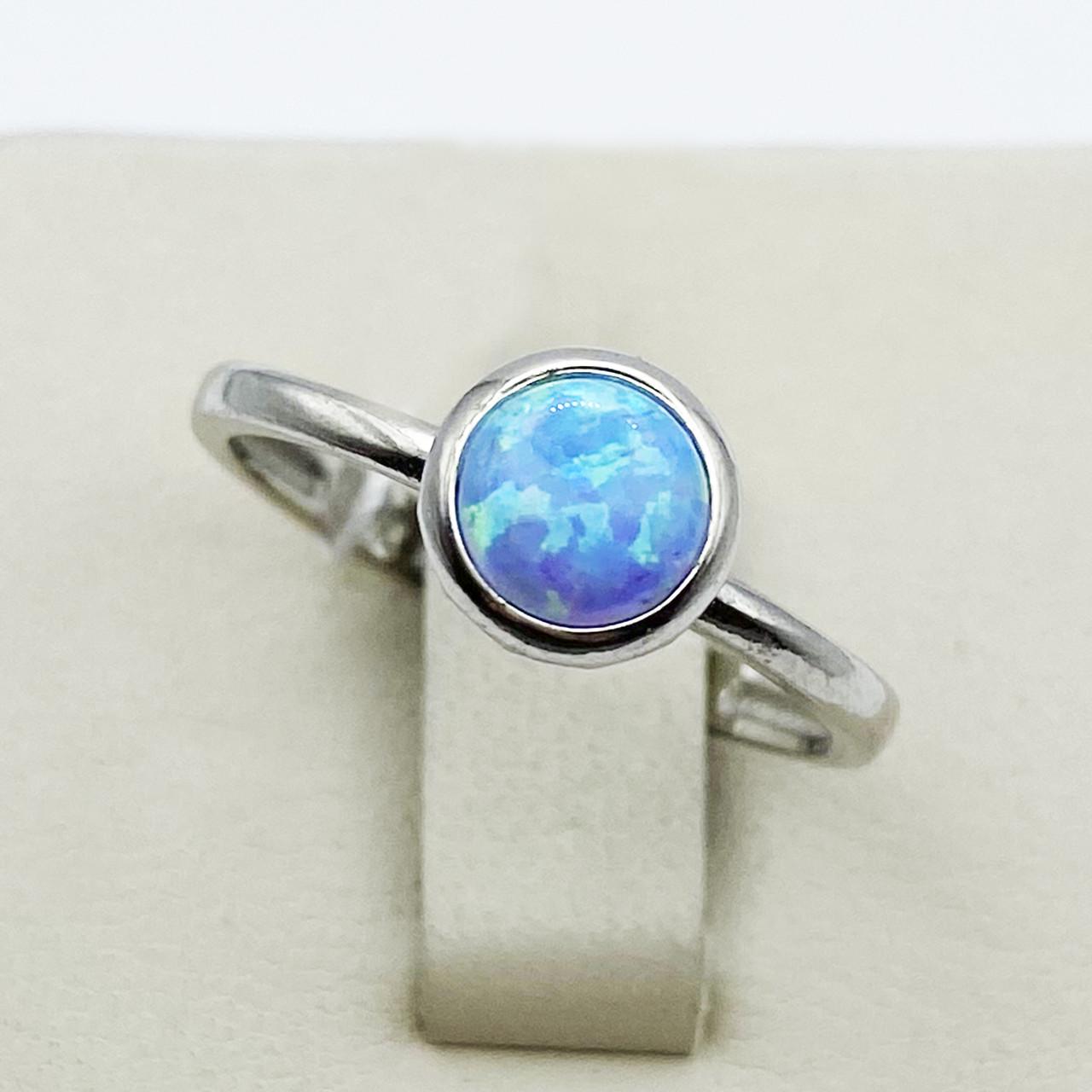 Каблучка срібна з блакитним опалом р. 18,5 1,75 г (1904308992)