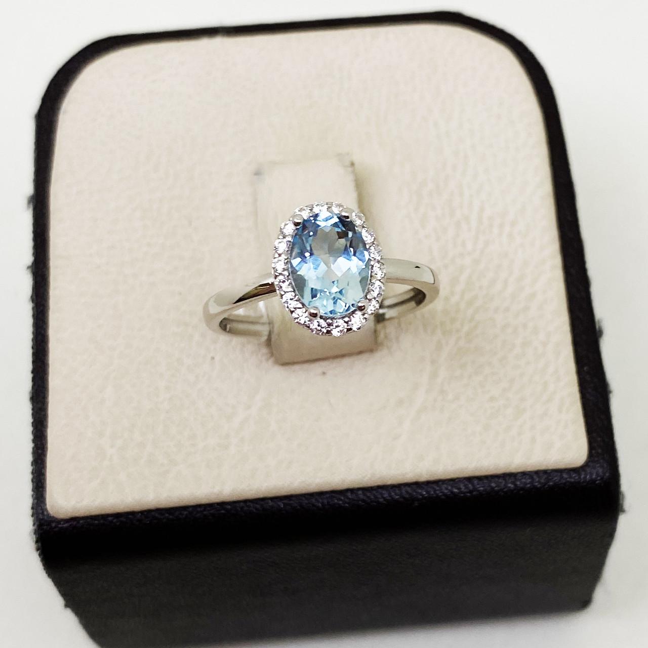 Кольцо серебряное с голубым топазом и фианитом р. 19 2,3 г (1765961649) Кольцо серебряное с голубым топазом и фианитом р. 19 2,3 г (1765961649)