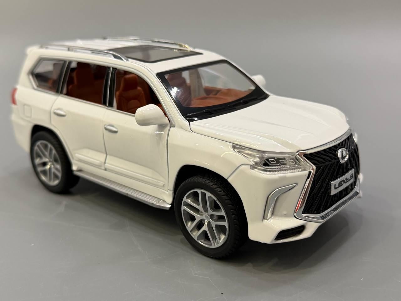 Машинка Lexus LX570 Авто Эксперт металлопластик 1:24 звук/свет/инерция Белый (1230-02) Машинка Lexus LX570 Авто Эксперт металлопластик 1:24 звук/свет/инерция Белый (1230-02)
