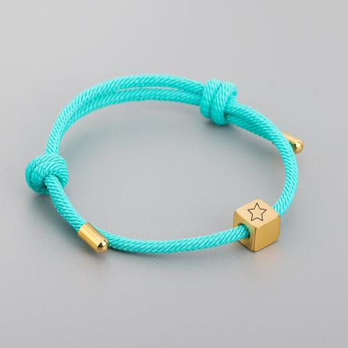 Браслет женский из нити и металлическими деталями и гравировкой (BR15TGE)