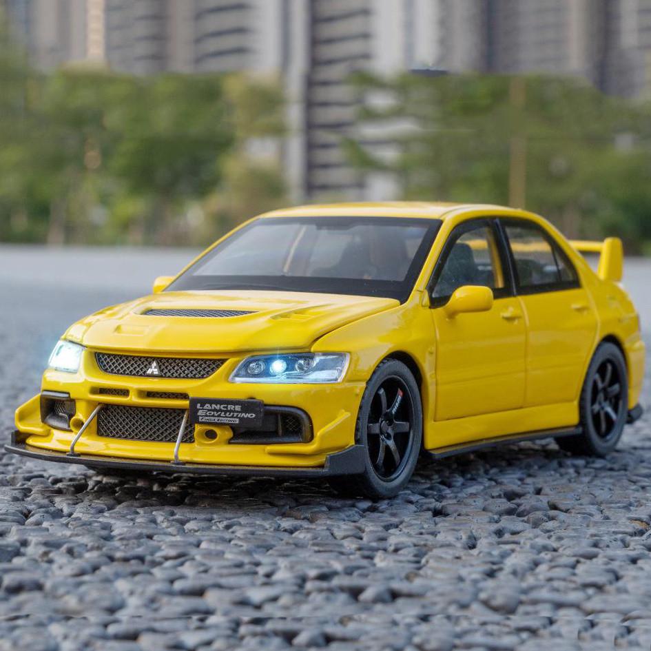 Машинка металлическая Mitsubishi Lancer Evolution IX 1:32 инерция/свет/звук/открываются двери (2677963159)
