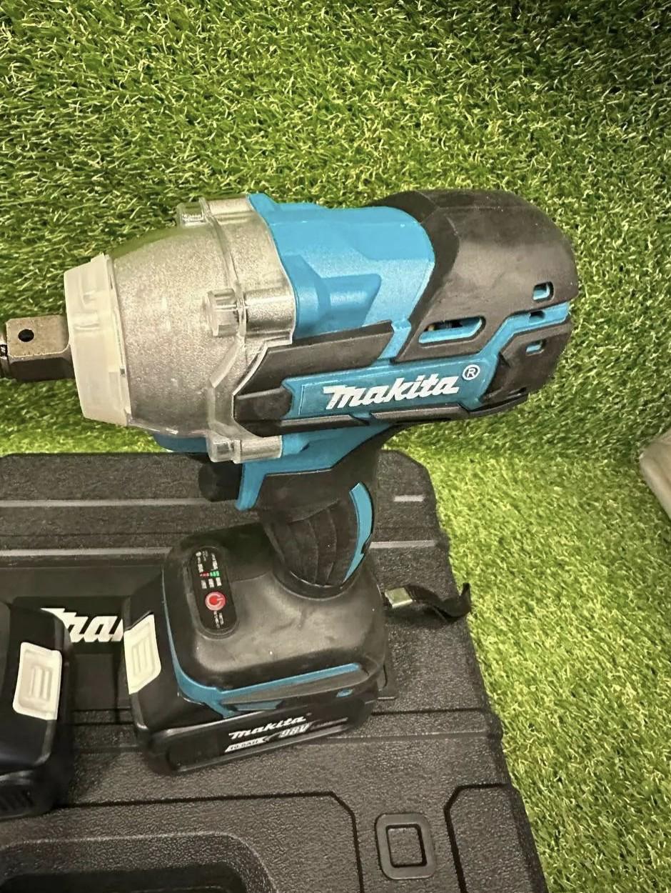 Гайковерт ударный Makita DTW401 аккумуляторный бесщеточный 48 В 6А/ч Черный (1230) - фото 4 Гайковерт ударный Makita DTW401 аккумуляторный бесщеточный 48 В 6А/ч Черный (1230) - фото 4