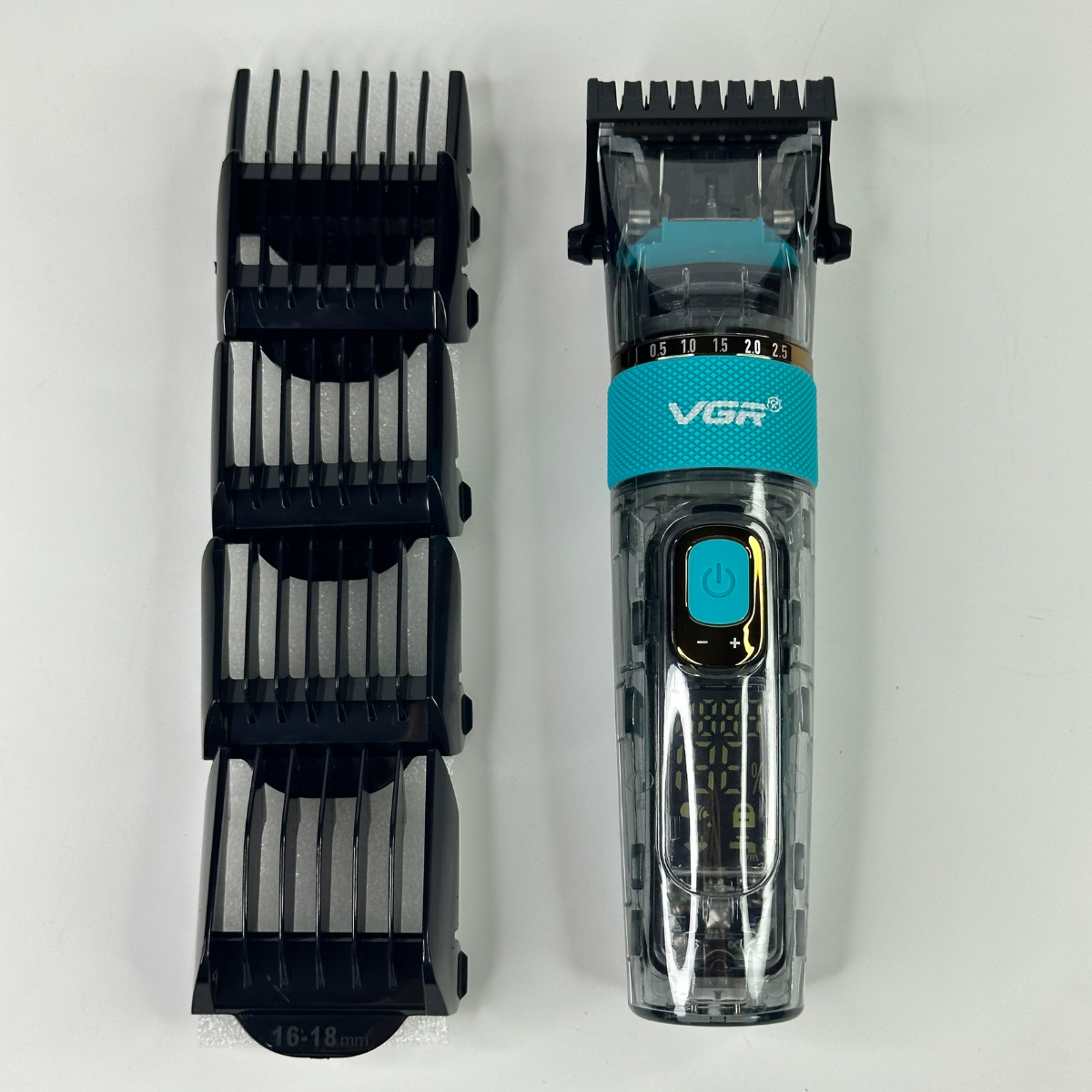 Машинка акумуляторна VGR V-695 для стрижки волосся та бороди з LED-дисплеєм Прозорий (17514598)