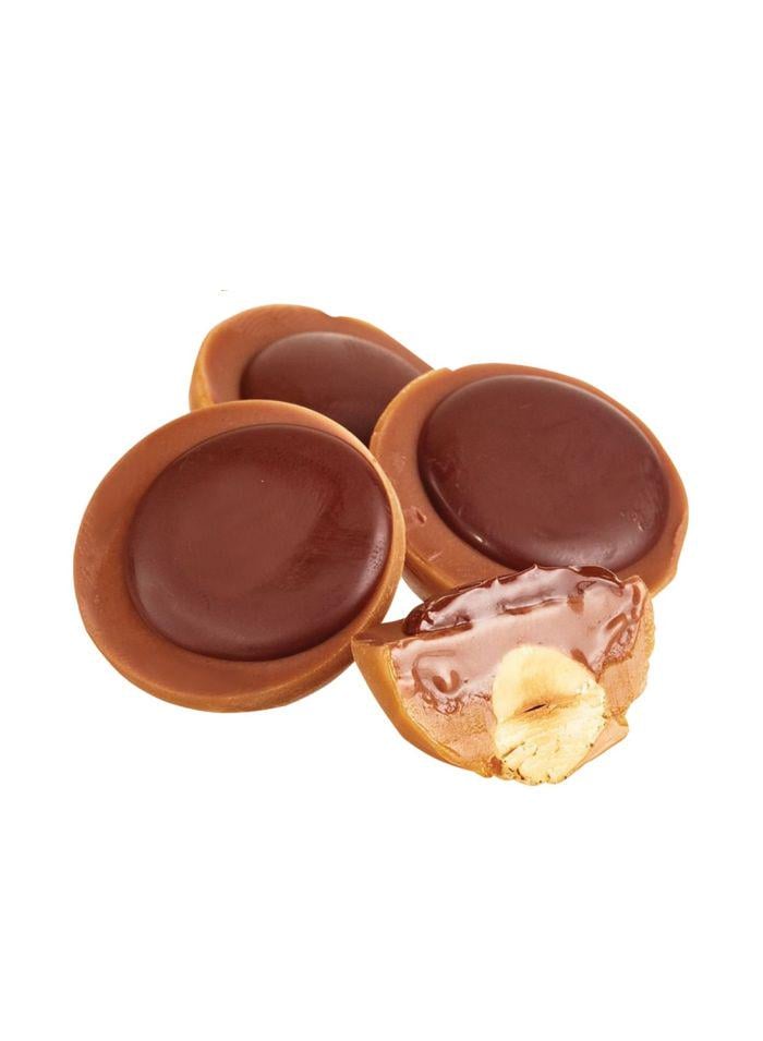 Конфеты с цельным фундуком Toffifee новогодний санта 375 г - фото 2 Конфеты с цельным фундуком Toffifee новогодний санта 375 г - фото 2