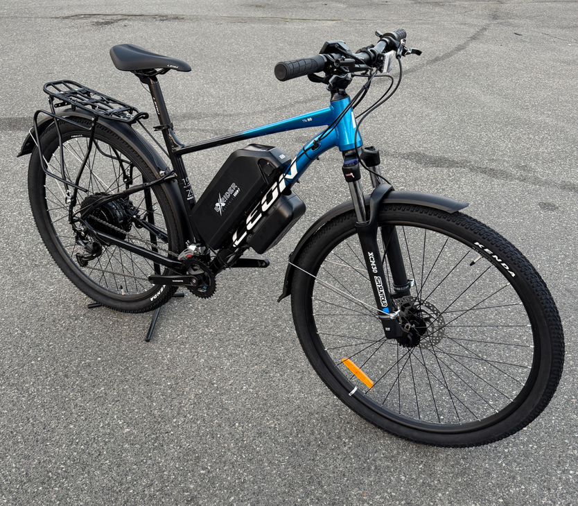 Велосипед с Е-комплектом с багажником Leon TN 80 HDD 2025 29" 48 В 500 Вт MXSUS 12 Ah до 45 км запас хода дисплей LSD10 Pas-ассистент