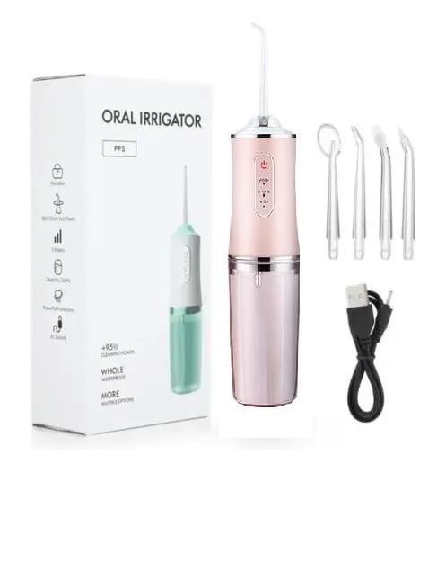 Іригатор для порожнини рота портативний Portable Oral Irrigator з 4 насадками Рожевий - фото 2