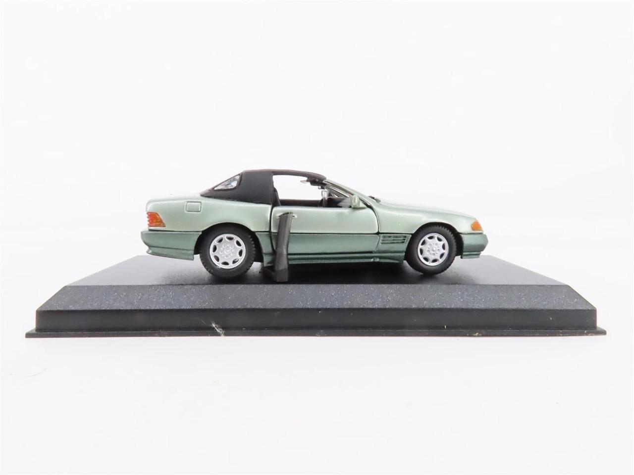 Игрушечная машинка Matchbox Collectibles 1:43 Mercedes 320 SL Soft Top 1990 s Detail Cars Titanium №232 (9DC-232) - фото 6 Игрушечная машинка Matchbox Collectibles 1:43 Mercedes 320 SL Soft Top 1990 s Detail Cars Titanium №232 (9DC-232) - фото 6