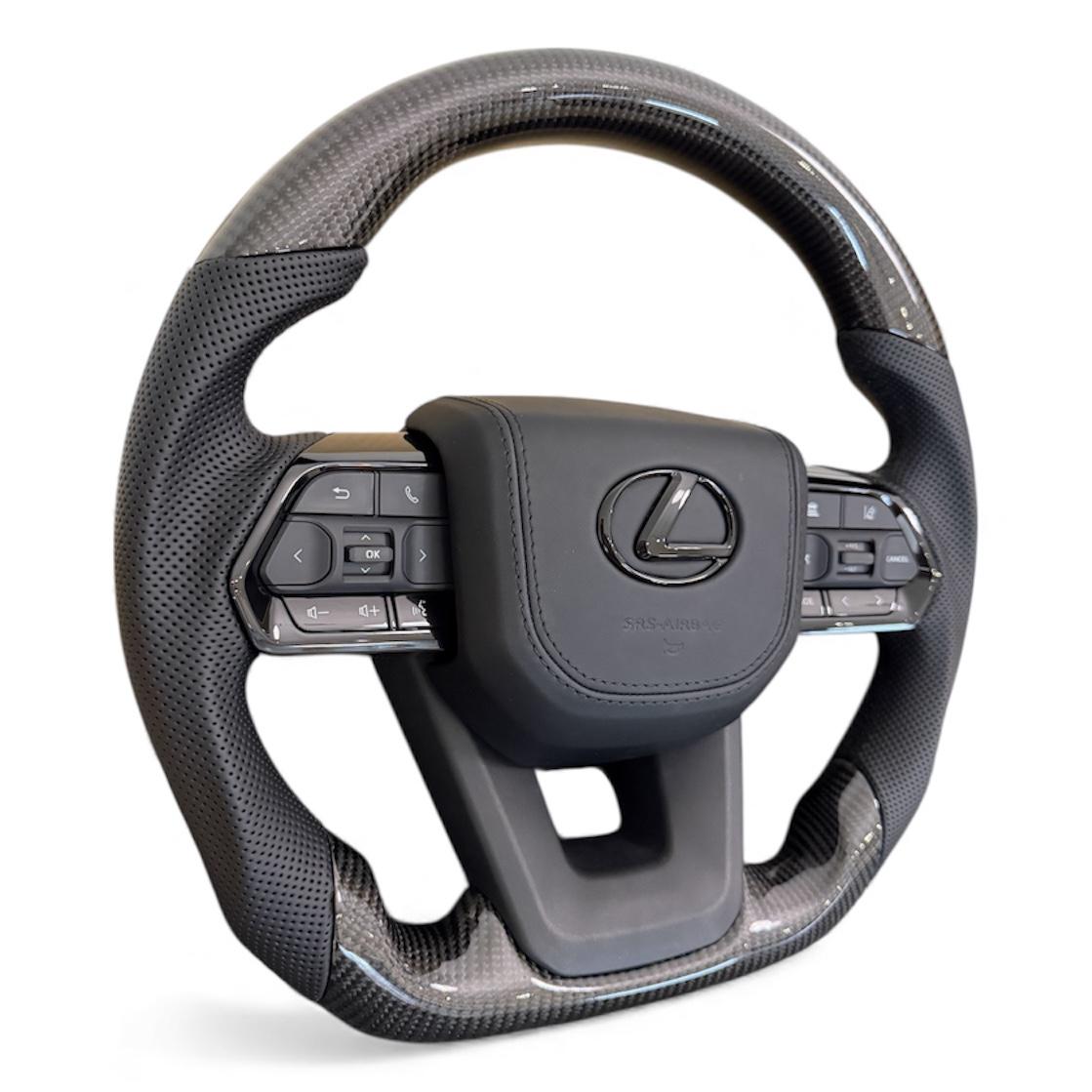 Руль анатомический для Lexus LX470/GX47 карбон подушка обшита кожей в сборе Черный глянец (30679300) - фото 2 Руль анатомический для Lexus LX470/GX47 карбон подушка обшита кожей в сборе Черный глянец (30679300) - фото 2