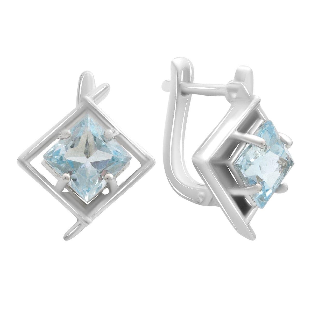 Сережки срібні з натуральним топазом квадратної форми у відкритій геометричній оправі Сережки срібні з натуральним топазом квадратної форми у відкритій геометричній оправі