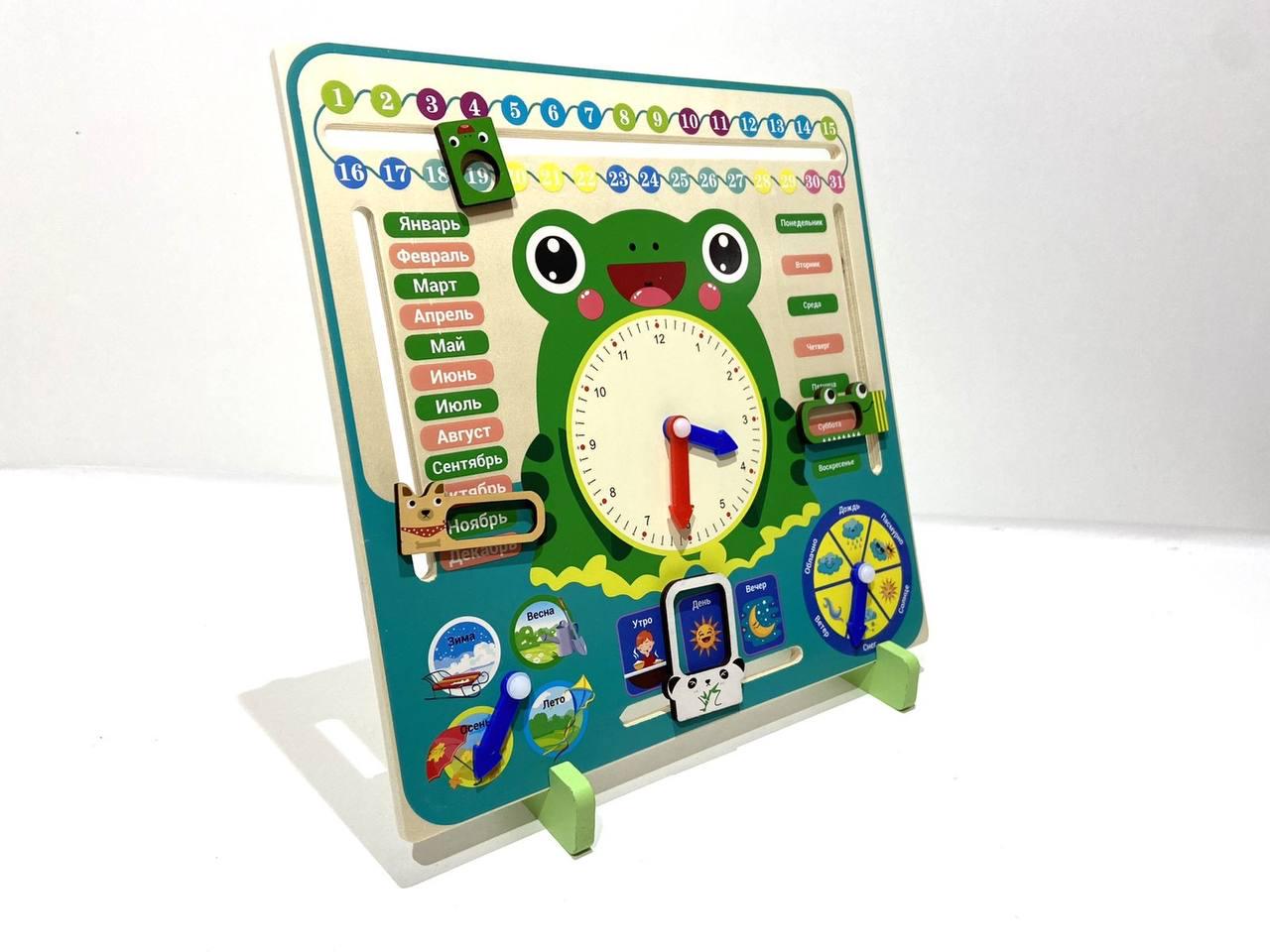 Деревянная развивающая игрушка Часы-календарь MD2852 30x30,5x14 см с погодой и датами