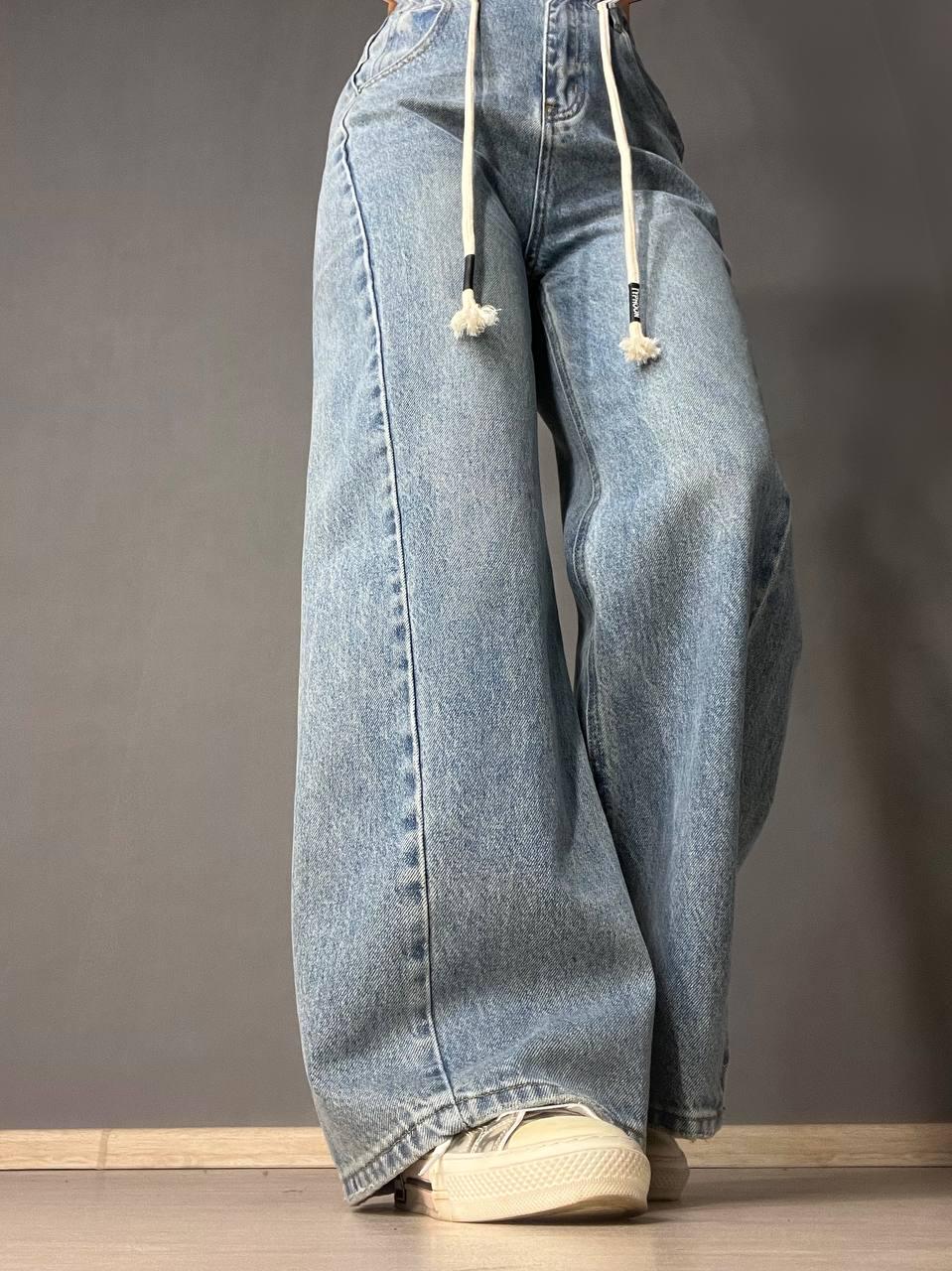 Джинси жіночі Simeile 89616 палаццо широкі зкошений шов попереду висока талія зі шнурком L Блакитний (3539) - фото 3 Джинси жіночі Simeile 89616 палаццо широкі зкошений шов попереду висока талія зі шнурком L Блакитний (3539) - фото 3