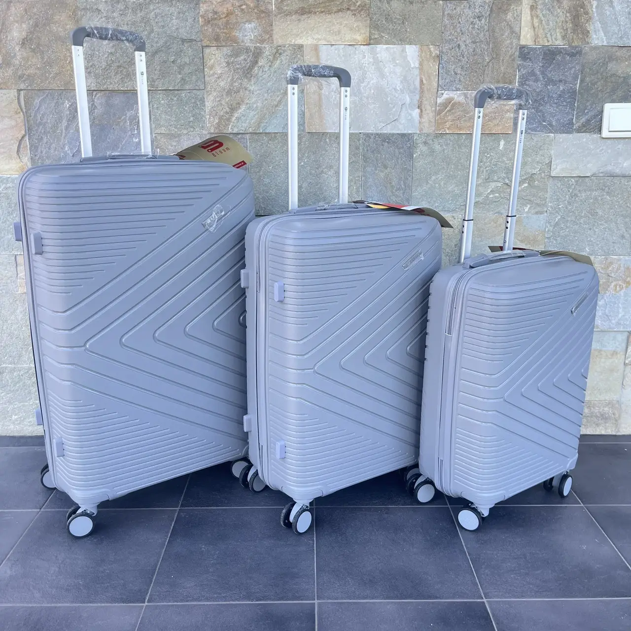 Чемодан дорожный из полипропилена Bloom 1706 средний М 63 л Серый - фото 7 Чемодан дорожный из полипропилена Bloom 1706 средний М 63 л Серый - фото 7