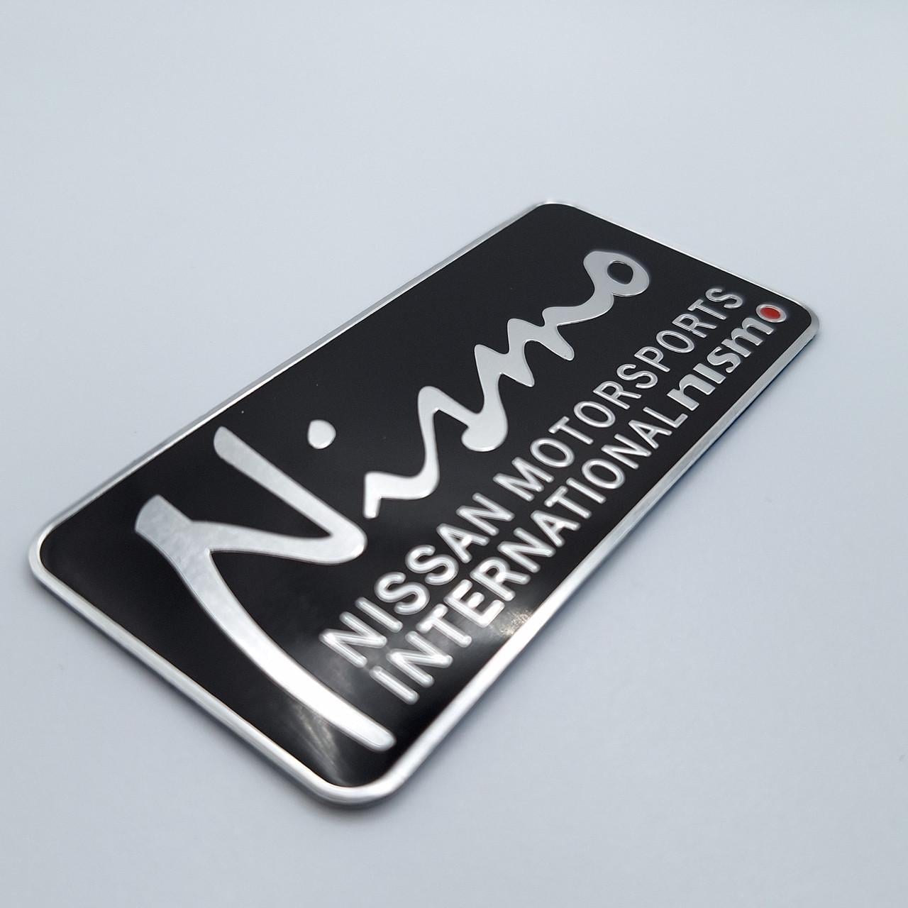 Эмблема алюминиевая Nismo Nissan 9х4,2 см Черный (1670454402)