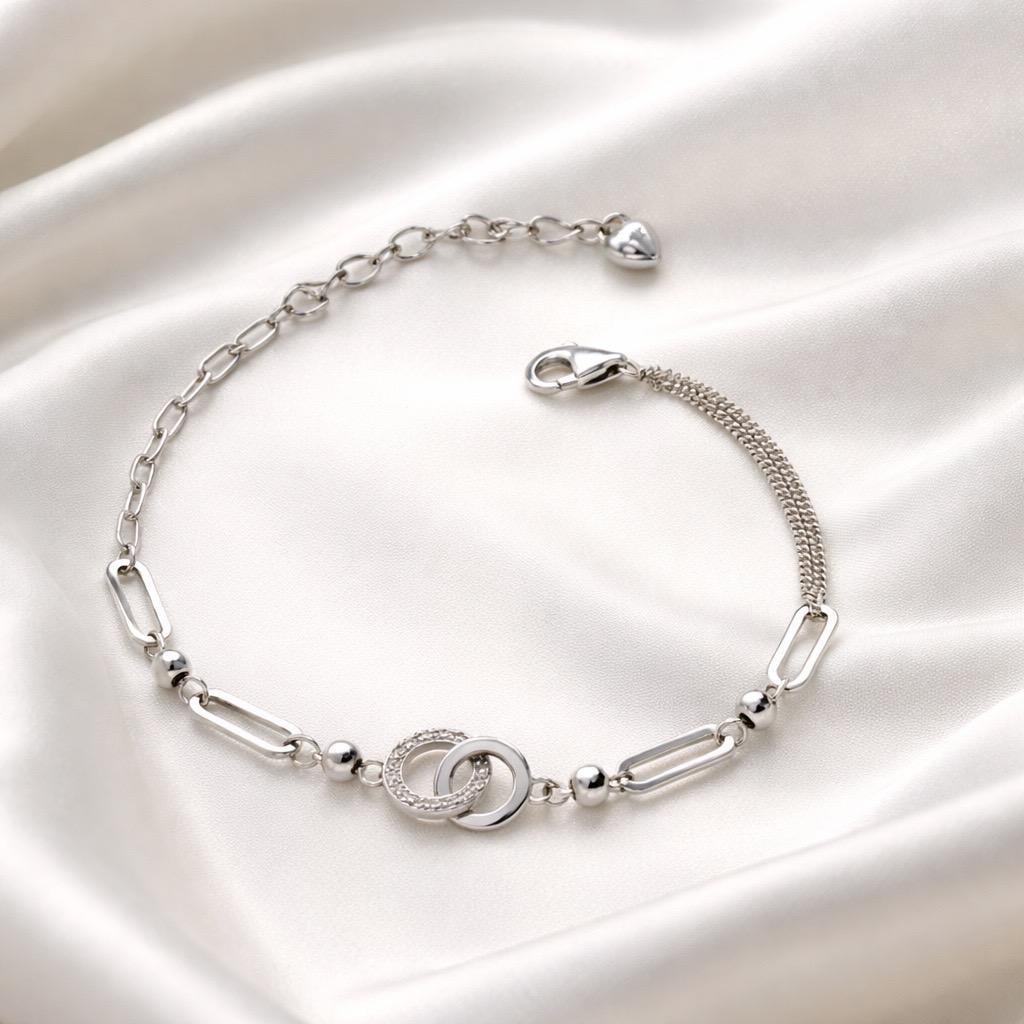 Браслет срібний із переплетеними колами та декоративними елементами р. 17-20 см