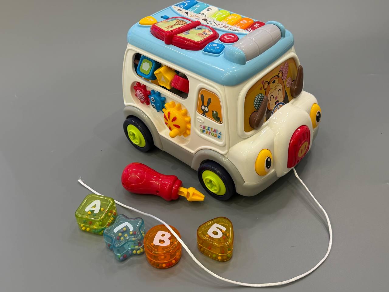 Музыкальный бизибус WToys озвучивание на украинском языке каталка подсветки/песни/ноты/мелодии/несколько режимов/сортер/шестерня/трещотки (45585)