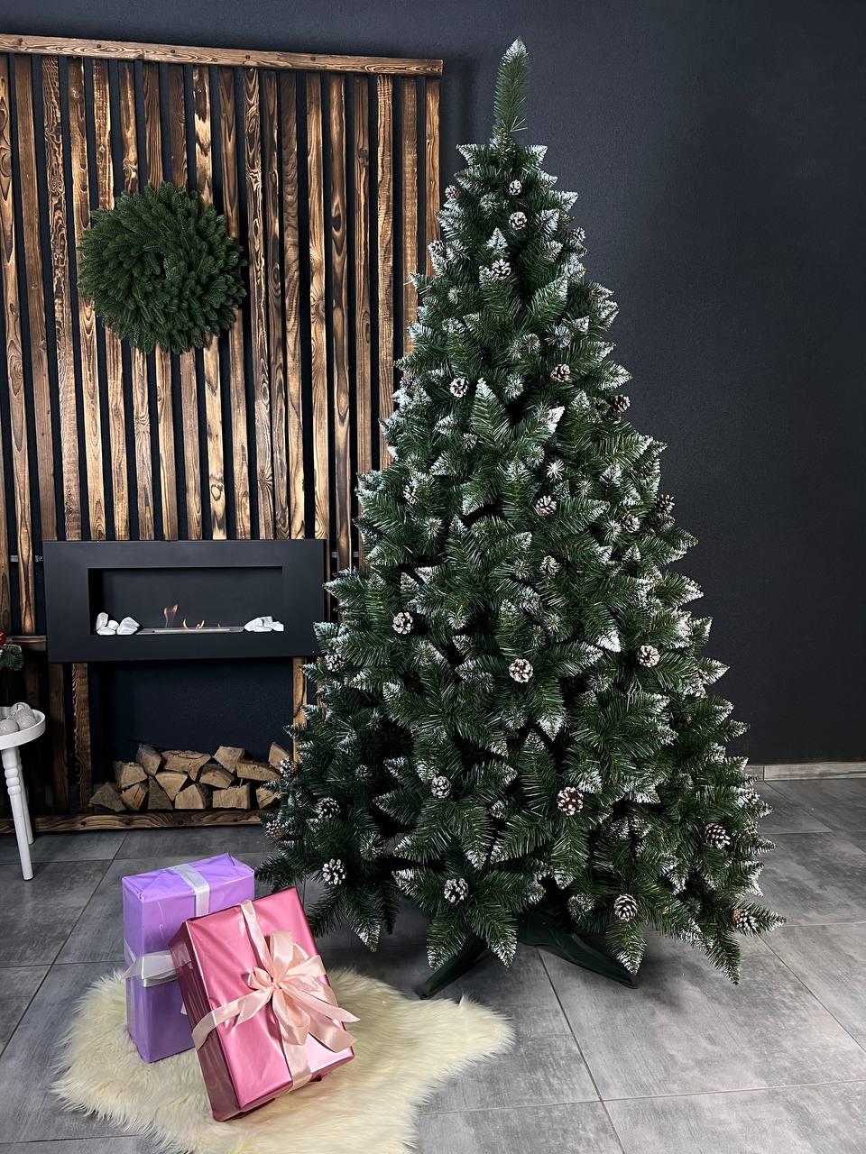 Штучна ялинка засніжена Елітна з шишками 2,1 м Зелений (YNK08172) - фото 1 Штучна ялинка засніжена Елітна з шишками 2,1 м Зелений (YNK08172) - фото 1