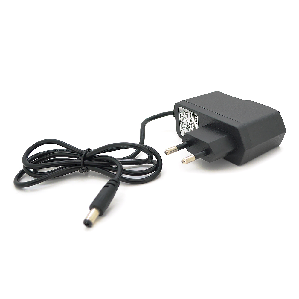 Адаптер живлення імпульсний JB-0510 для медіаплеєрів та тюнерів 5 В 1 А 5 Вт штекер 5,5/2,5 мм (1321)