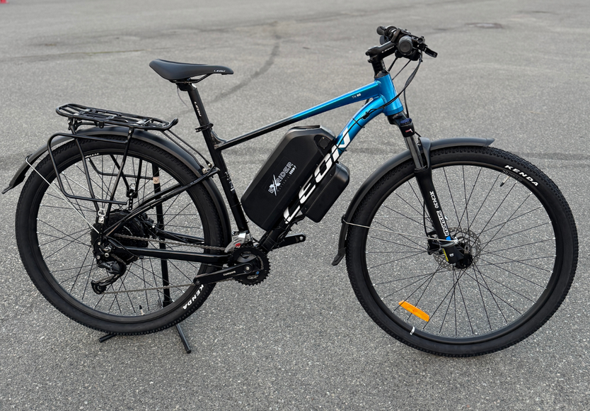 Велосипед с Е-комплектом с багажником Leon TN 80 HDD 2025 29" 48 В 1000 Вт MXSUS 24 Ah до 75 км запас хода дисплей LSD10 Pas-ассистент