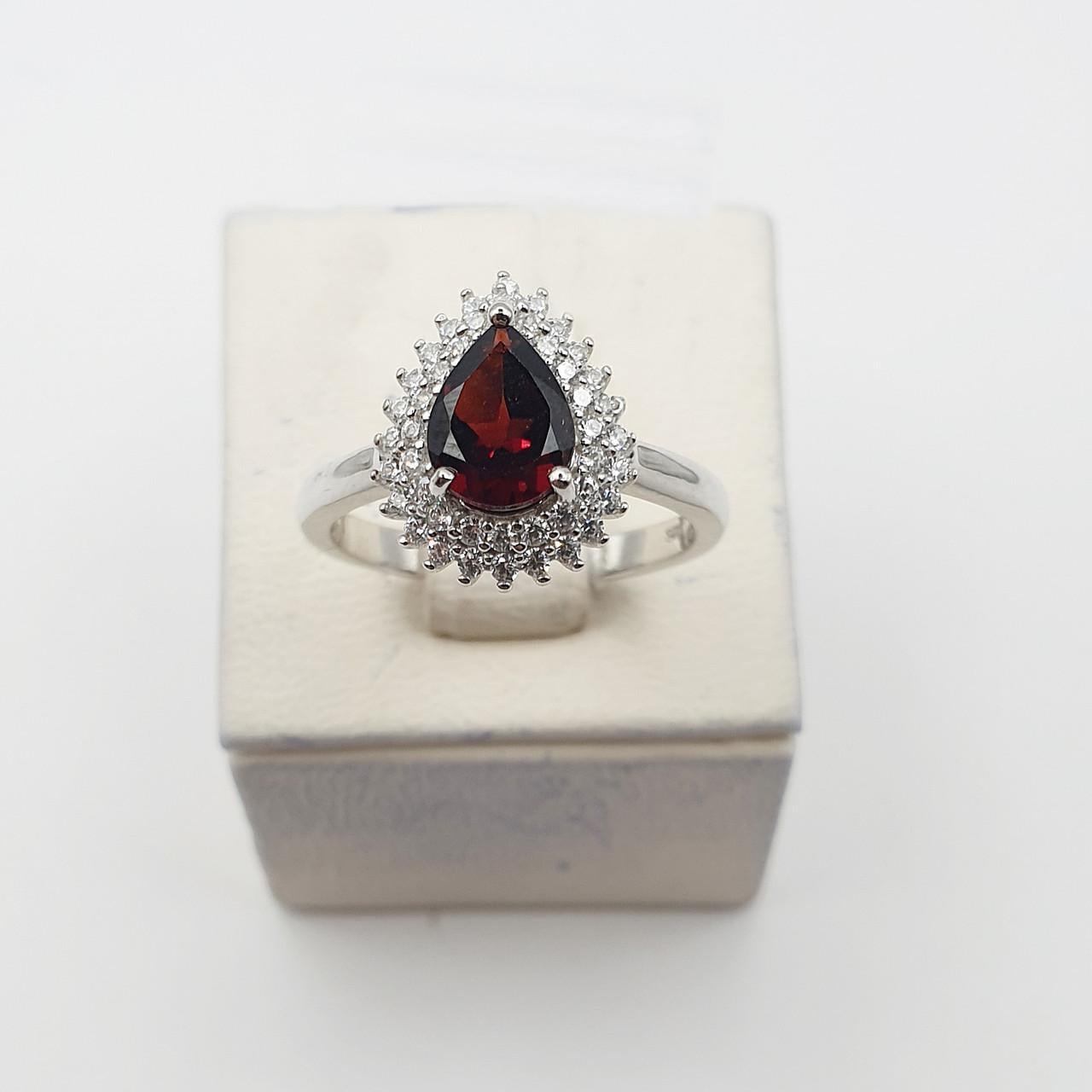 Кольцо серебряное с гранатом р. 18 3,18 г (2685696273)